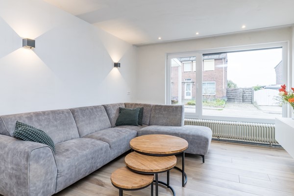 Foto - Te koop: Instapklaar gemoderniseerde geschakelde 2 onder 1 kap woning met voldoende woonoppervlakte, garage, berging en tuin in Simpelveld (Huls)